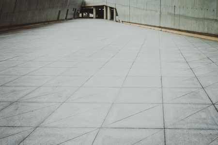 empty, modern square and skyscrapers in modern cityの写真素材