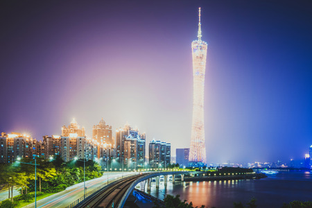 the light trails on the modern building background in guangzhou china.のeditorial素材