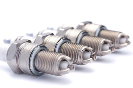 Four spark plugs for car's engineの写真素材