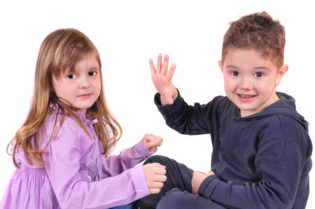 The boy and girl on a white backgroundの写真素材
