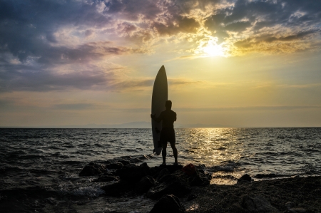 Sunset Surfer Silhouetteの写真素材