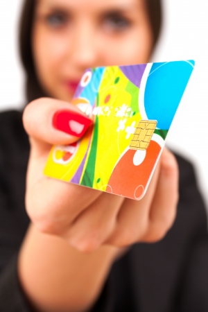 A Happy Woman holding a credit cardの写真素材