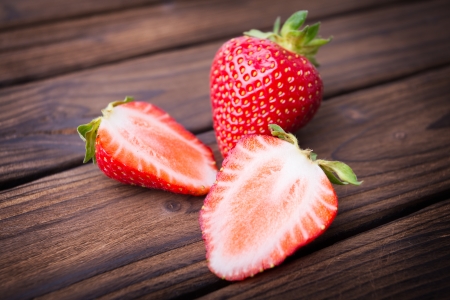fresh strawberries  on the wooden tableの写真素材