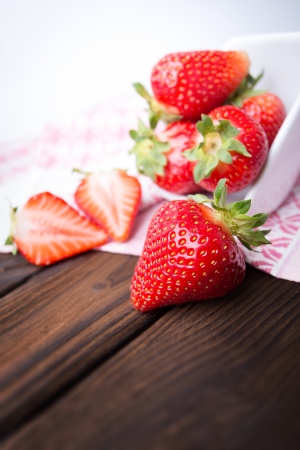 fresh strawberries  on the wooden tableの写真素材