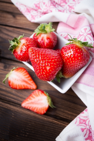 fresh strawberries  on the wooden tableの写真素材