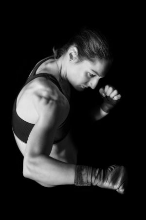 female boxer in a fighting poseの写真素材