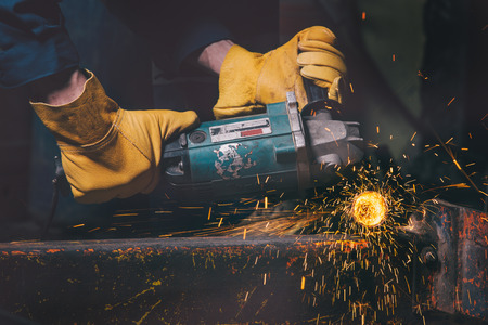 Worker cutting metalの写真素材