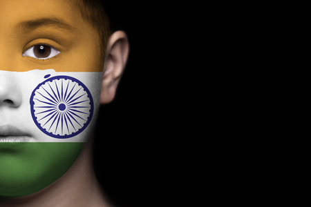 Human face painted with flag of Indiaの写真素材