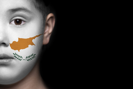 Human face painted with flag of Cyprusの写真素材