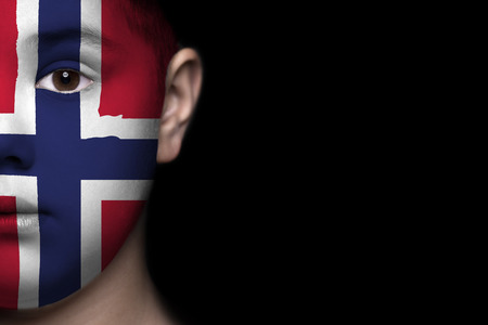 Human face painted with flag of Norwayの写真素材