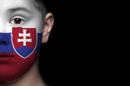 Human face painted with flag of Slovakiaの写真素材