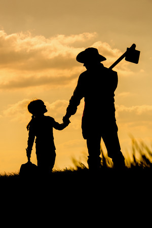 Farmer and sunset の写真素材