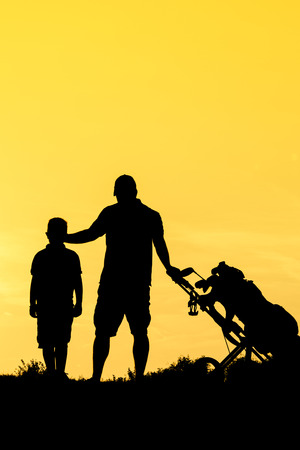 Golf sunset silhouetteの写真素材