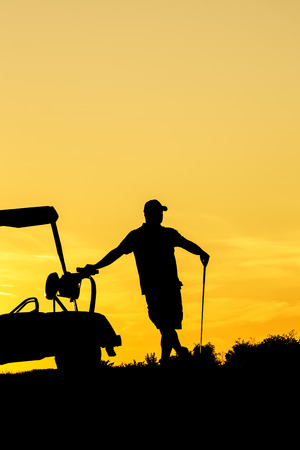 Golf sunset silhouetteの写真素材