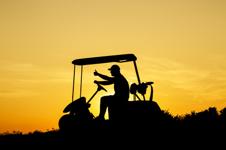 Golf sunset silhouetteの写真素材