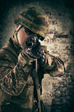 Young soldiers with gunsの写真素材