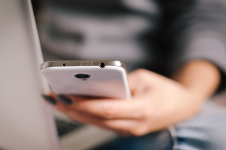 Woman Using a Smart Phoneの写真素材