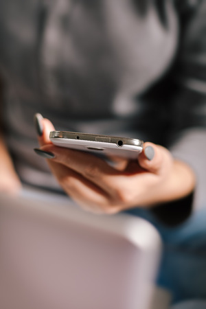 Woman Using a Smart Phoneの写真素材