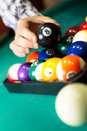 Billiard balls in a pool table