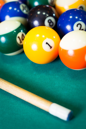 Billiard balls in a pool table