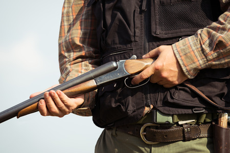 Hunter ready to hunt with hunting rifle