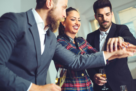 Business people cheering with hands together