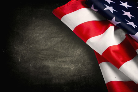 Vintage American flag on a chalkboard with space for text