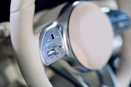 Detail on some buttons on a steering wheelの写真素材