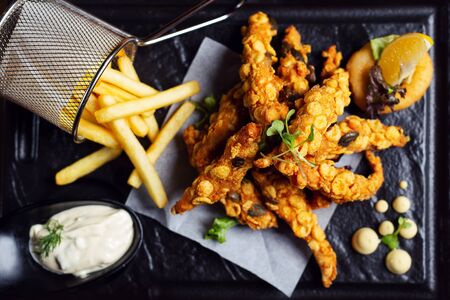 Tasty crispy chicken wings. Dish for dinner on plate.の写真素材