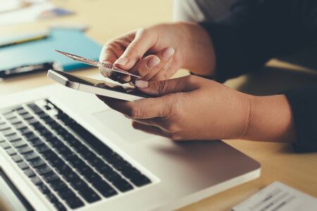 Shopping and online payment by using notebook.の写真素材