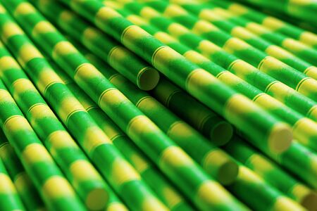 Stripped Green Paper Straws. Ideal for summer drinks and smoothies.の写真素材