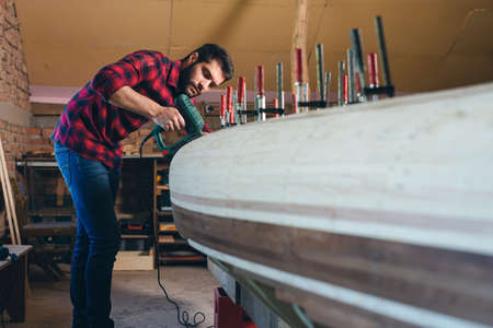 Portrait of farmer standing in corn field.の写真素材