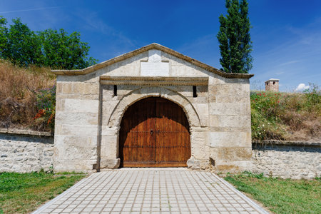 Wooden gate of the fortified medieval monastery manasija, built by despot stefan lazareviÄ, with a watchtower in the backgroundの写真素材
