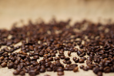Coffee beans on sackclothの写真素材