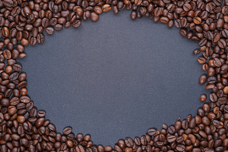 Coffee beans frame on dark backgroundの写真素材