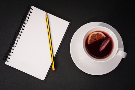 White cup with red teaの写真素材