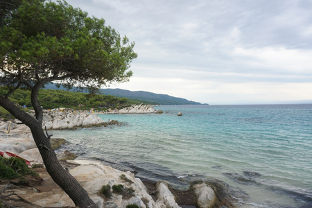 Sea shore at cloudy weather before rain. Cloudy wrather at sea beachの写真素材
