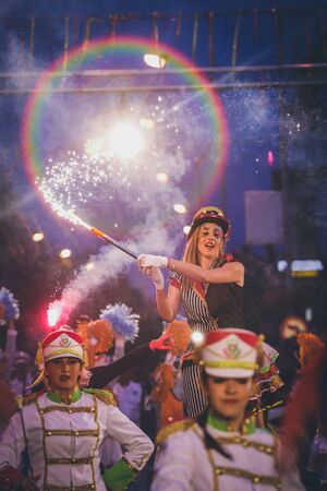 Pancevo - Serbia 06.17.2017. Woman with torch on carnival paradeのeditorial素材