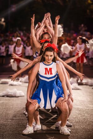 Pancevo - Serbia 06.17.2017. Group of cheerleaders dance on carnival parade