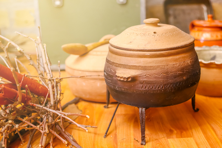 Pot for cooking meals on fire, made of clay. Traditional pot made of clayの写真素材