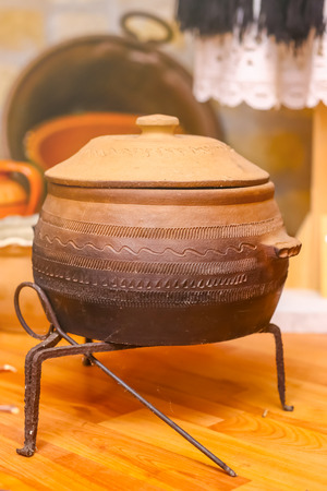 Pot for cooking meals on fire, made of clay. Traditional pot made of clayの写真素材