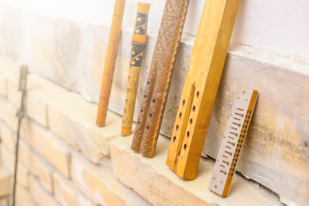 Traditional Serbian wooden frula on wall. Traditional Serbian music instrument.の写真素材