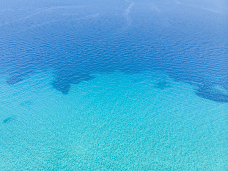 Drone aerial view of blue sea water.の写真素材
