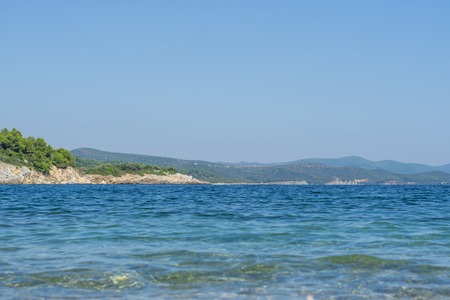 Sea water on sunny day, nature background. Ocean view on sunny summer dayの写真素材