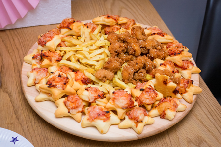 Delicious snacks of food arranged on a plate.の写真素材