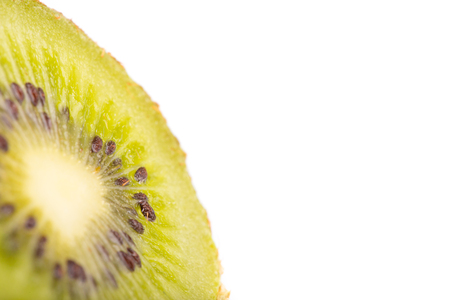 Close up detail of green fresh kiwi fruit on white background.の写真素材