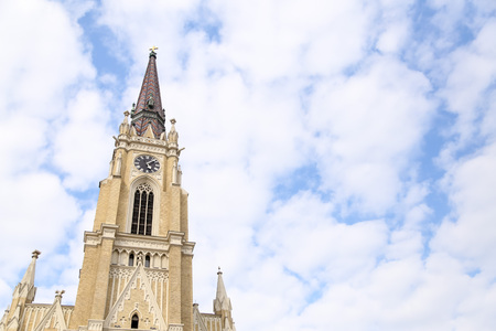 The Name of Mary Church, Novi Sad catholic cathedral during a spring partly cloudy day.の写真素材