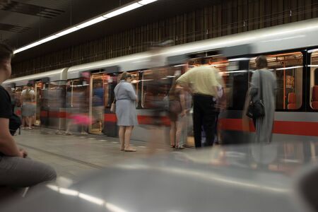 Prague, Czech Republic,23 July 2019; People at metro station entering subway train, long exposure technique for movement. Urban scene, city life, public transport and traffic concept.のeditorial素材