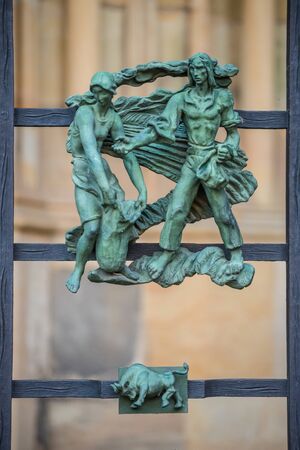 Decorations figure on the gothic gate fence at St. Vitus Cathedral in Pragueの写真素材