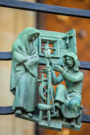 Decorations figure on the gothic gate fence at St. Vitus Cathedral in Pragueの写真素材